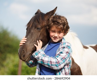 Horse and Jockey - Little boy and little horse - best friends - Powered by Shutterstock