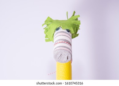 A horse made by children from swimming noodle and sock