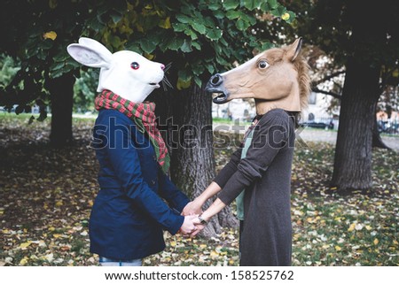 Similar – loving couple in the Park wearing pajamas