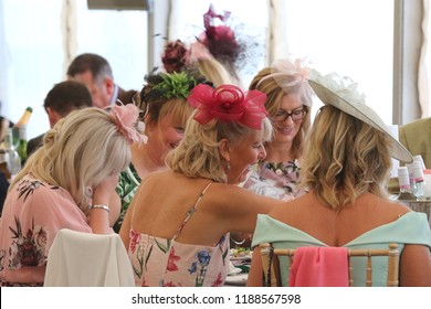 HORSE RACING - Group Of Women Laughing Enjoy Social Atmosphere And Occasion Of Thirsk Races Ladies Day : Thirsk Racecourse, Nth Yorkshire, UK : 8 September 2018 