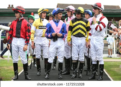HORSE RACING - Jockeys enter the Parade Ring at Thirsk Races : Thirsk Racecourse, Nth Yorkshire, UK : 4 August 2018 : Pic Mick Atkins