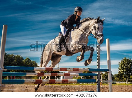 Horse rider in action under blue sky. Сток-фото © 
