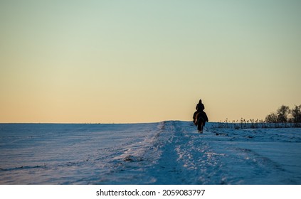 Horse Rider In The Snow