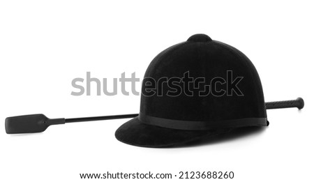 Horse riding helmet and crop on white background