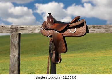 Horse Saddle On Rural Fence