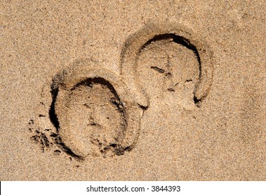 Horse Shoe Prints On A Sandy Beach.