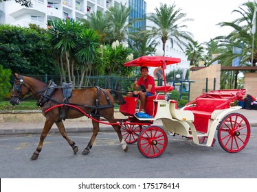 HORSE TAXI CARRIAGE-SEPTEMBER 09:Retro Styled Horse Carriage Taxi In Alcudia City In September 09, 2013 On Majorca. Horse Taxi Services It's A Very Popular Tourist Attraction In Majorca.