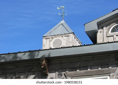 Horse Weather Vane On Top Of A Barn