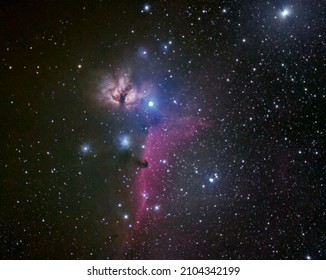 Horsehead and Flame nebulae in the winter night sky, shot with personal telescope