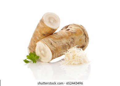 Horseradish root and grated horseradish isolated on white background