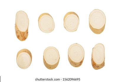 Horseradish root with slices isolated on white background - Shutterstock ID 1562096695