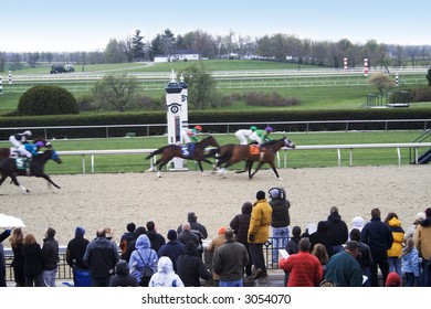 Horses Crossing The Finish Line In A Close Race At Keenland RAce Track In Lexington, Kentucky