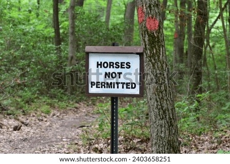 Horses not permitted on hiking bike trail sign