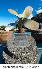 Horseshoe Bay Park, Canada, September 20, 2016 - This propeller, from the deep sea tug "Samarinda", was cast from 5000lbs of bronze with deep blade pitches that were required in heavy ocean towing.