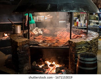 Horseshoe Shaped Grill At Salt Lick Barbecue In Driftwood, Texas.