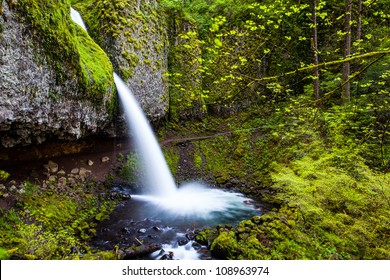 Horsetail Shape Waterfalls Fall From The Cliff