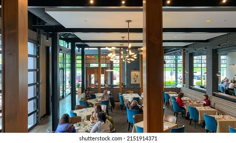 Horsham, PA, USA - April 23 2022: The Copper Crow Modern American Restaurant Inside People Eating