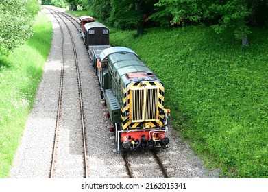 Horsted Keynes, West Sussex, UK-May 29 2022: Class 09 D4106 pulling freight towards Horsted Keynes station. 
