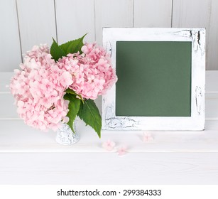 Hortense In Old Cracked  Vase And Retro Photo Frame On Wooden Board