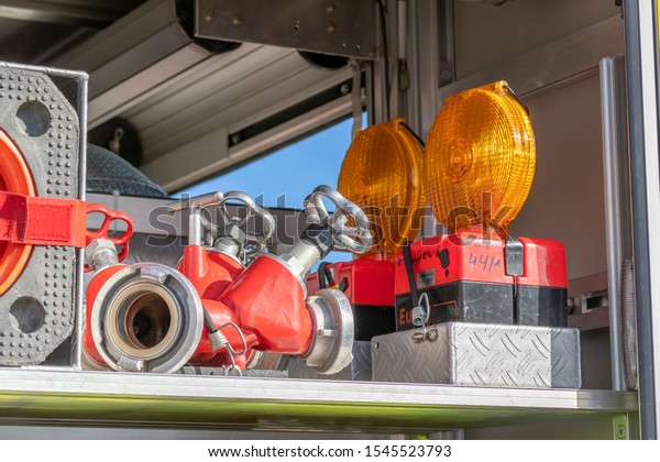 Hose\
connections in a fire department emergency\
vehicle