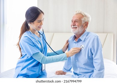 Hospice Nurse Is Using Stethoscope On Caucasian Man In Bed For Diagnosing Lung Cancer And Heart Rate At Pension Retirement Center For Home Care Rehabilitation And Post Treatment Recovery Process