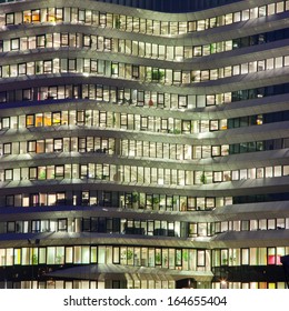 Hospital Building Lights At Night In The City With People At Work