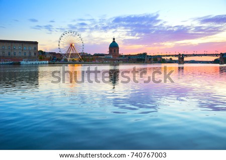  Hospital de La Grave and Ferries Wheel reflected in Garone river. Toulouse, France