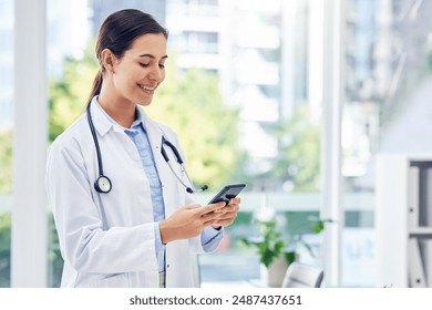 Hospital, doctor or happy woman with phone for research, reading news or medical information. Clinic, neurologist or texting on mobile app technology for social media, patient record or telehealth - Powered by Shutterstock