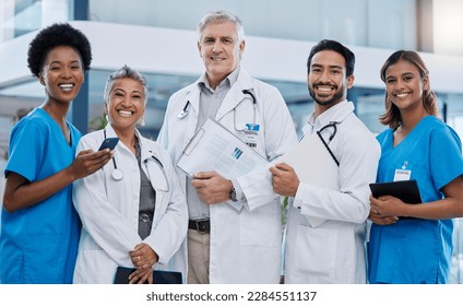 Hospital, doctor team portrait and leadership smile in clinic feeling happy with vision. Healthcare, wellness and diversity group with nursing solidarity and stethoscope ready for medical teamwork - Powered by Shutterstock