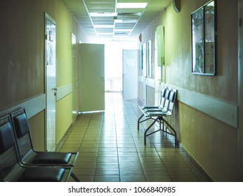hospital empty corridor with light in the end  - Shutterstock ID 1066840985