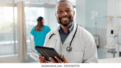 Hospital, face and black man with a tablet, doctor and typing with website info, internet and consultant. African person, portrait and medical professional with tech, clinic and research with email - Powered by Shutterstock