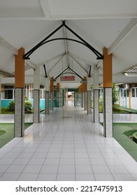 Hospital Hallway With A Red Warning Sign That Says No Smoking