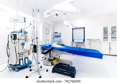 Hospital interior with operating surgery table, lamps and ultra modern devices, technology in modern hospital