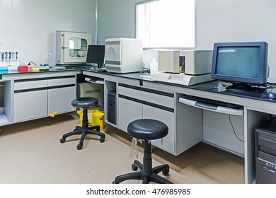 hospital lab with computer and chemistry equipment.