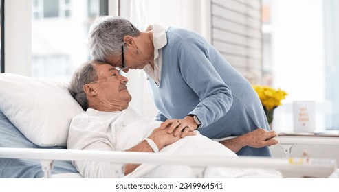 Hospital, love or elderly couple, sick patient and affection for empathy, marriage bond and support for senior person. Retirement healthcare, forehead and man with medical problem, cancer or disease - Powered by Shutterstock