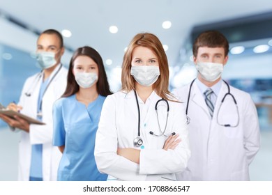 Hospital medical staff team wearing a uniform and masks - Shutterstock ID 1708866547