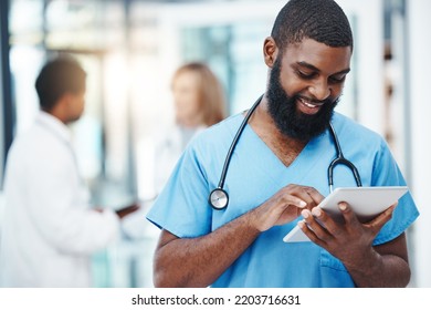 Hospital Nurse And Man On Tablet For Medical News On Science Breakthrough With Online App. Healthcare Worker Checking Digital Device For Medicine Research Announcement On Social Media.