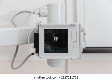 Hospital Radiology Room. X-ray Department In Modern Hospital. Medical Equipment. Scan Machine For Fluorography. Technician Adjusting An Xray Machine. Scanning Chest, Heart, Lungs In Modern Clinic