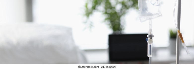 Hospital Room For Patient With Comfortable Bed And Drop Bottle