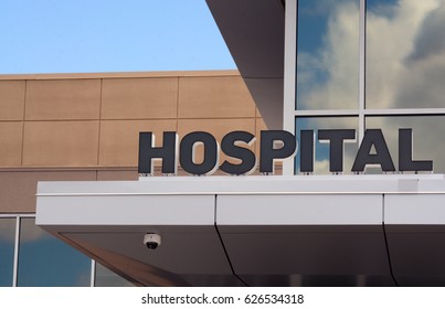 Hospital Sign At Entrance Of Small Hospital Building