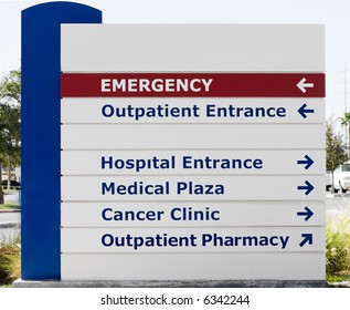 Hospital Sign Showing Direction To Different Medical Services