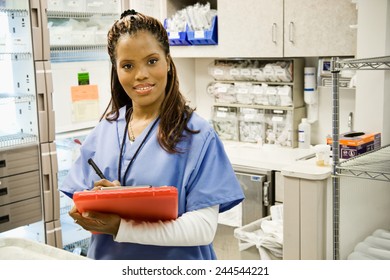 Hospital: Smiling Nurse In Supply Room