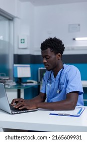 Hospital Specialized Nurse Analyzing Patient Medical Tests Results And Writing Prescription Based On Illness And Health Condition Of Patient. Healthcare Staff Reviewing Consultation Files And