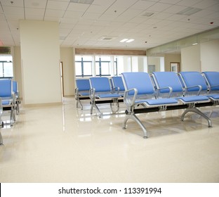 Hospital Waiting Room With Empty Chairs.