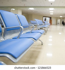 Hospital Waiting Room With Empty Chairs.