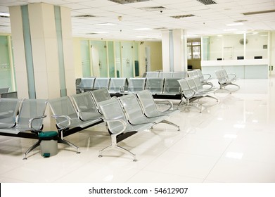 Hospital Waiting Room With Empty Chairs.