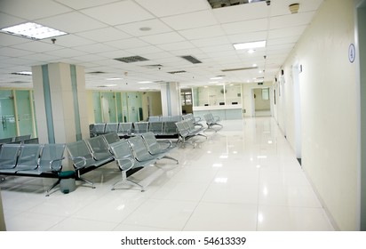 Hospital Waiting Room With Empty Chairs.