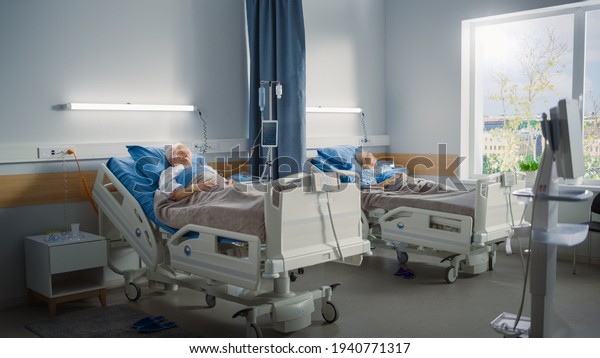 Hospital Ward Elderly Old Man Young Stock Photo 1940771317 | Shutterstock