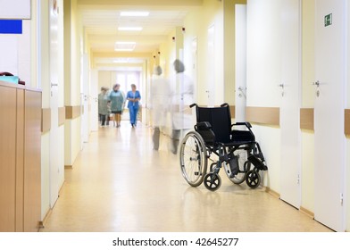 Hospital, wheelchair and unrecognizable people. - Powered by Shutterstock