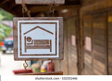 Hostel Sign Board On Wooden In Thailand.